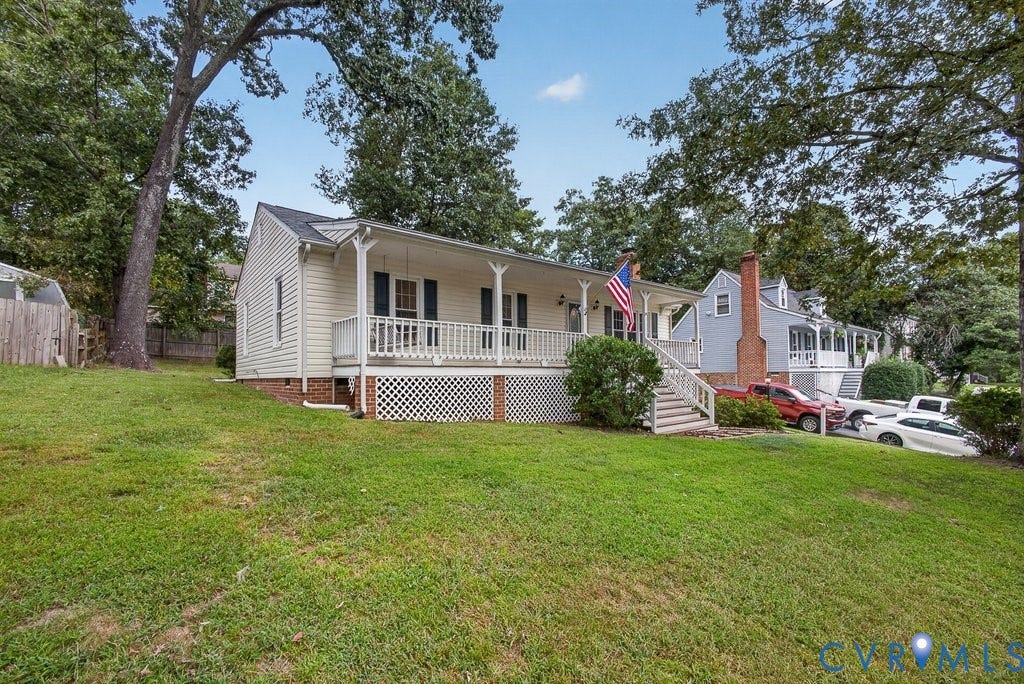 3112 Castlebury Drive, Chester, VA 23831 Siding exterior with a covered front porch, white railing, and exterior shutters
