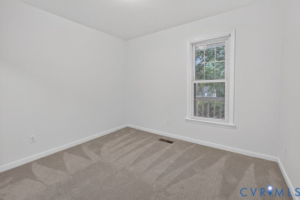 3112 Castlebury Drive, Chester, VA 23831 Neutral wall paint, window with blinds, and carpeted flooring