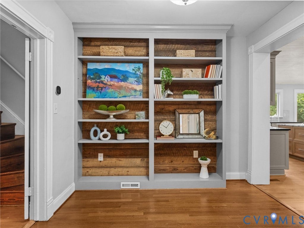 3403 W Franklin Street, Museum District, Richmond, VA 23221 Built-in shelving with reclaimed wood backing, crown molding, and hardwood flooring