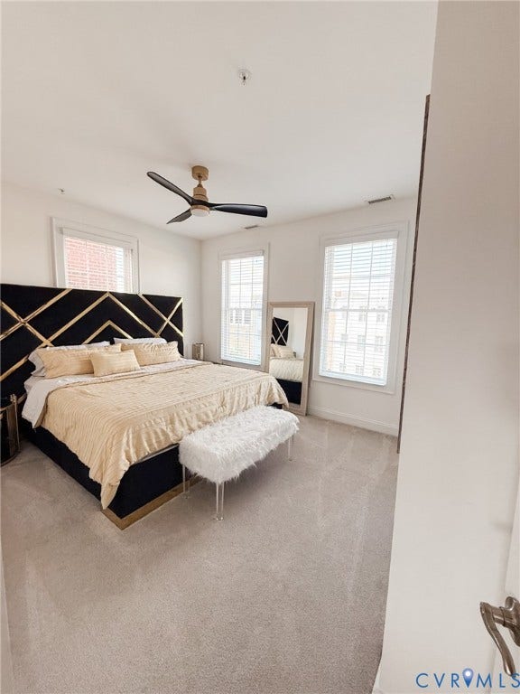 3332 Haydenpark Lane, Henrico, VA 23233 Carpeted room featuring multiple windows with blinds, a ceiling fan, and white walls