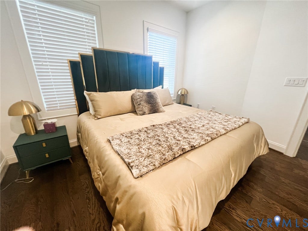 3332 Haydenpark Lane, Henrico, VA 23233 Dark wood-finish flooring with white baseboards