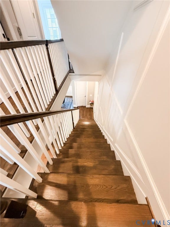 3332 Haydenpark Lane, Henrico, VA 23233 Hardwood staircase with white risers and dark wood handrails