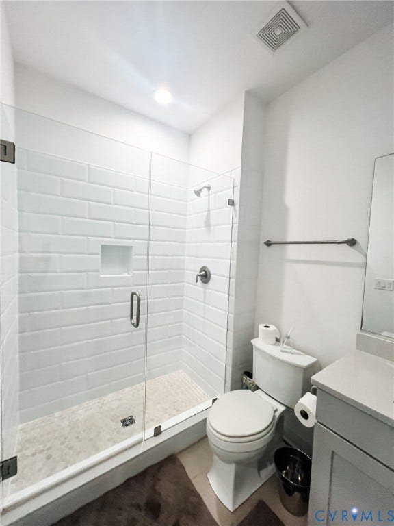 3332 Haydenpark Lane, Henrico, VA 23233 Glass-enclosed shower with subway tile surround and recessed niche