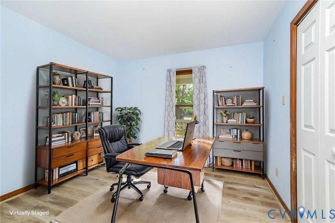 AI STAGED Wood-finish flooring with light-toned walls