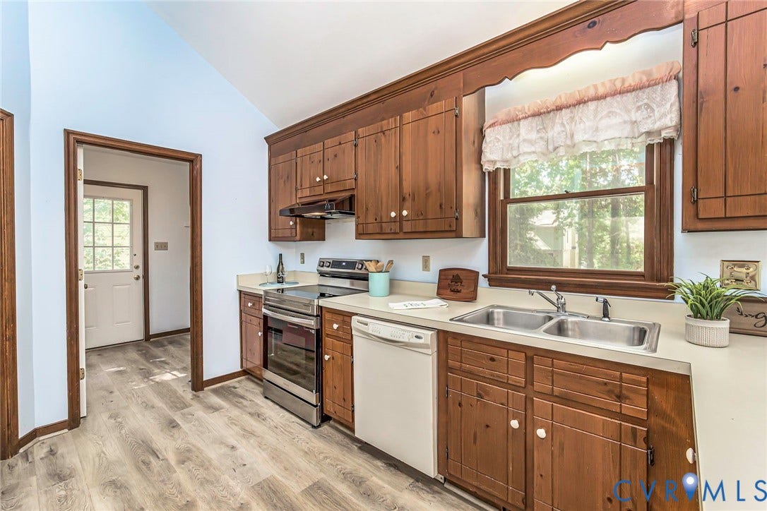 Wood-finish flooring with a vaulted ceiling