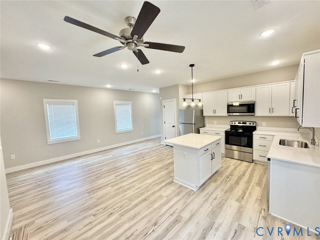 Option to pick countertops, paint, cabinets & on 1st floor -stained concrete floors or upgrade to LVP.