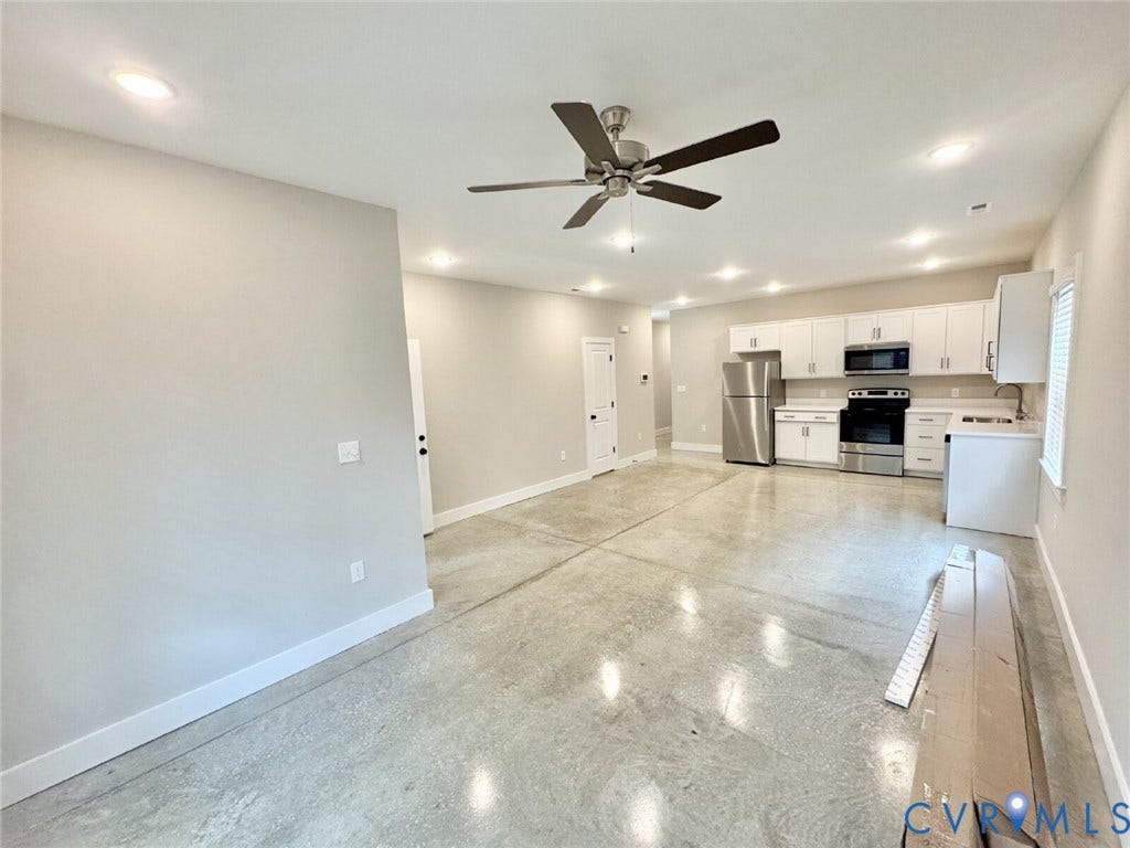 Example of stained concrete floor option. Home will have an island in kitchen.