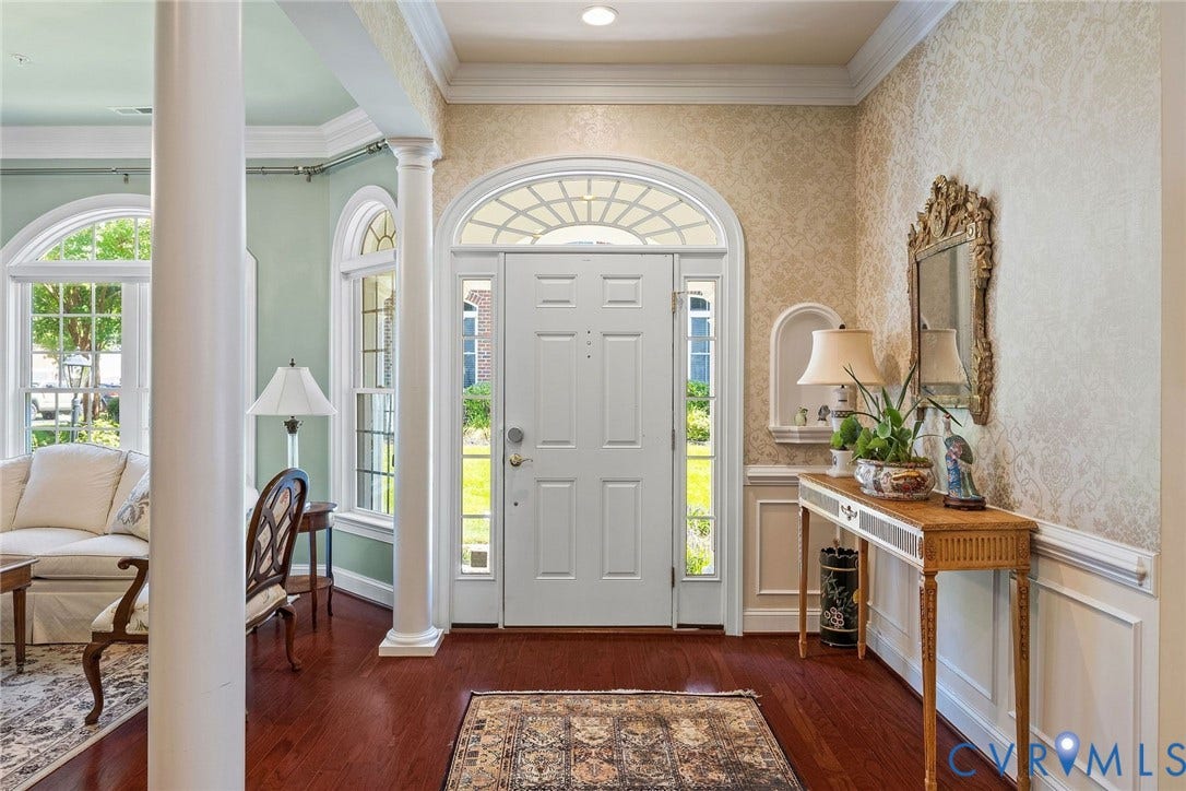 Foyer, Crown & Chair Molding, Hardwood Floors.