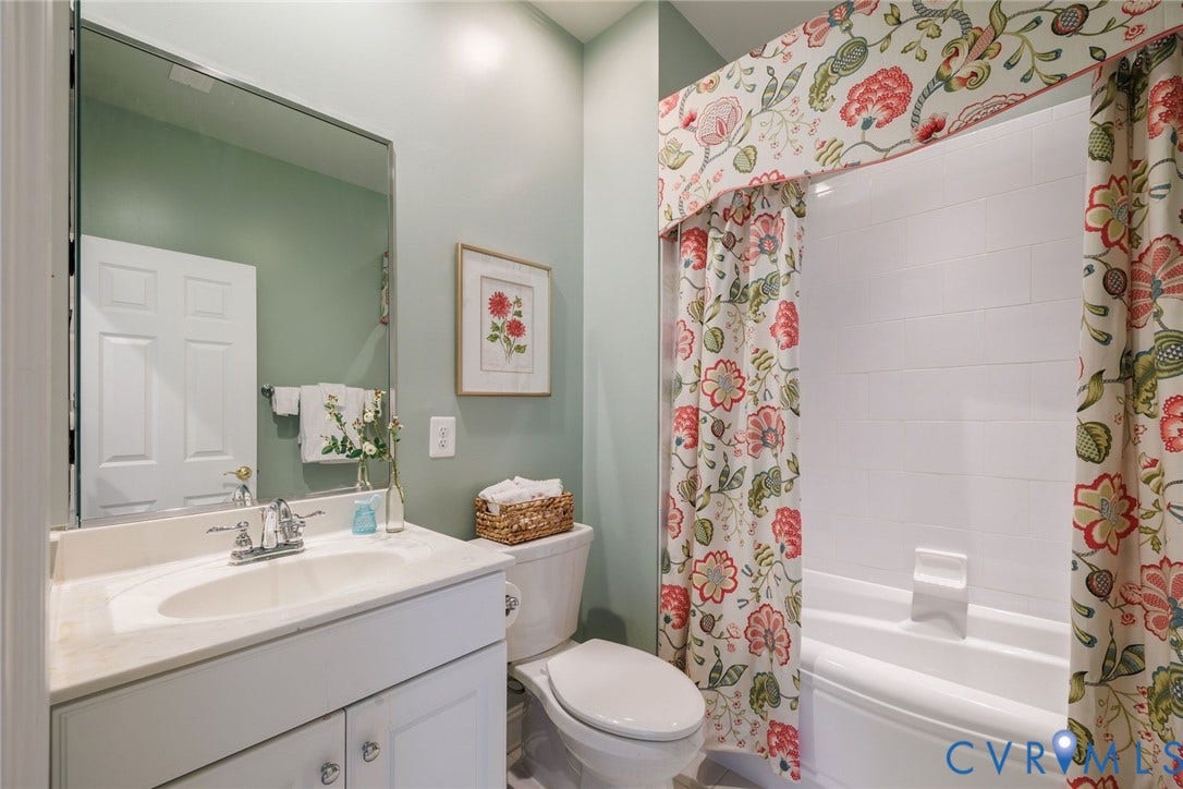Ensuite for Bedroom 3 with Custom Shower Curtain.