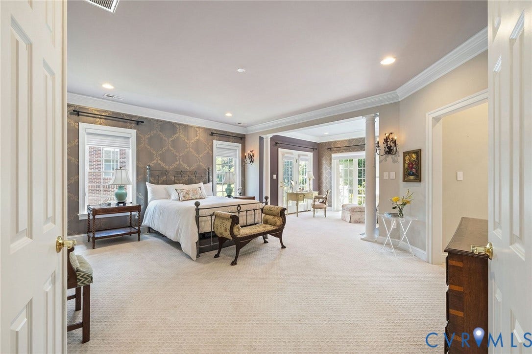 Grand Primary Suite and Ensuite.  Large Primary Bedroom, Sitting Area, Carpet, 10' ft Ceiling, Crown Moulding.