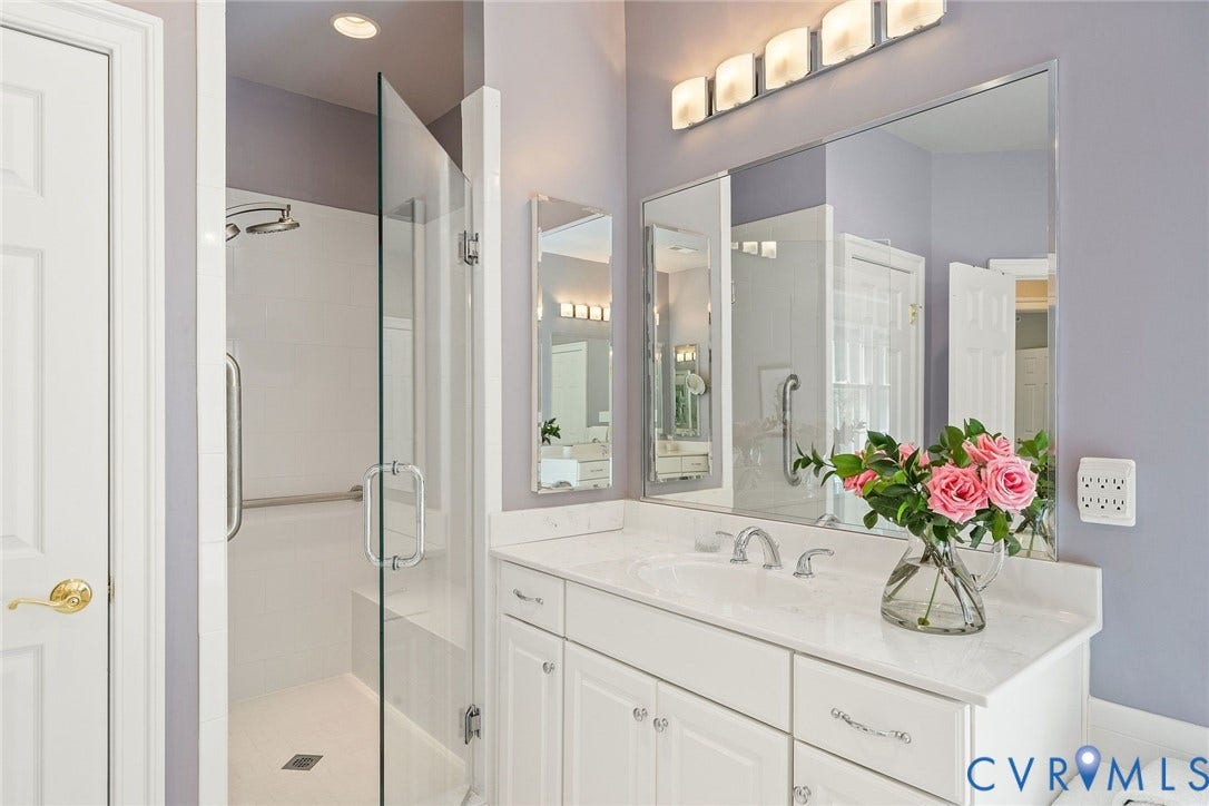 Large Walk-in Tiled Shower with Seat.