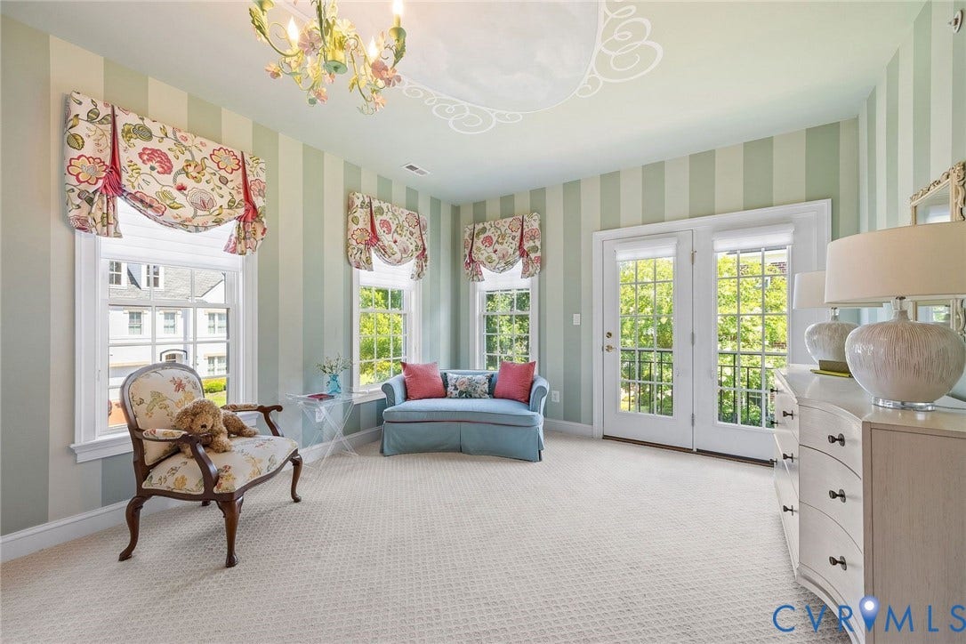 Sitting Area for Bedroom 3. Balcony, Custom Drapes. Designer Chandelier, Carpet.