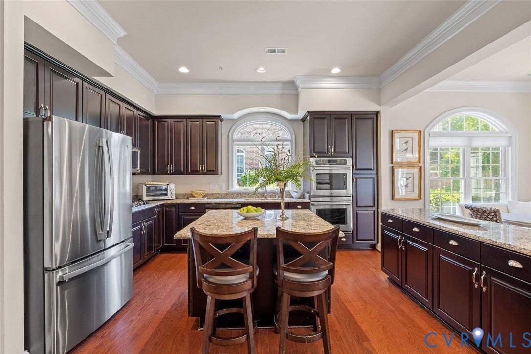 New Stainless Steele Appliances, Granite Counters, Granite Island, Double Oven, Gas Cooktop, Hardwood Floors, Crown Moulding, 10' Ceiling, Recessed Lighting.