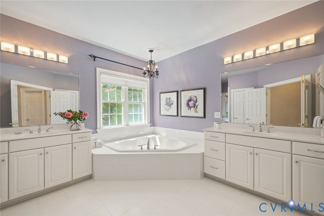 Dual Vanities, Garden Soaking Tub, Carpet.
