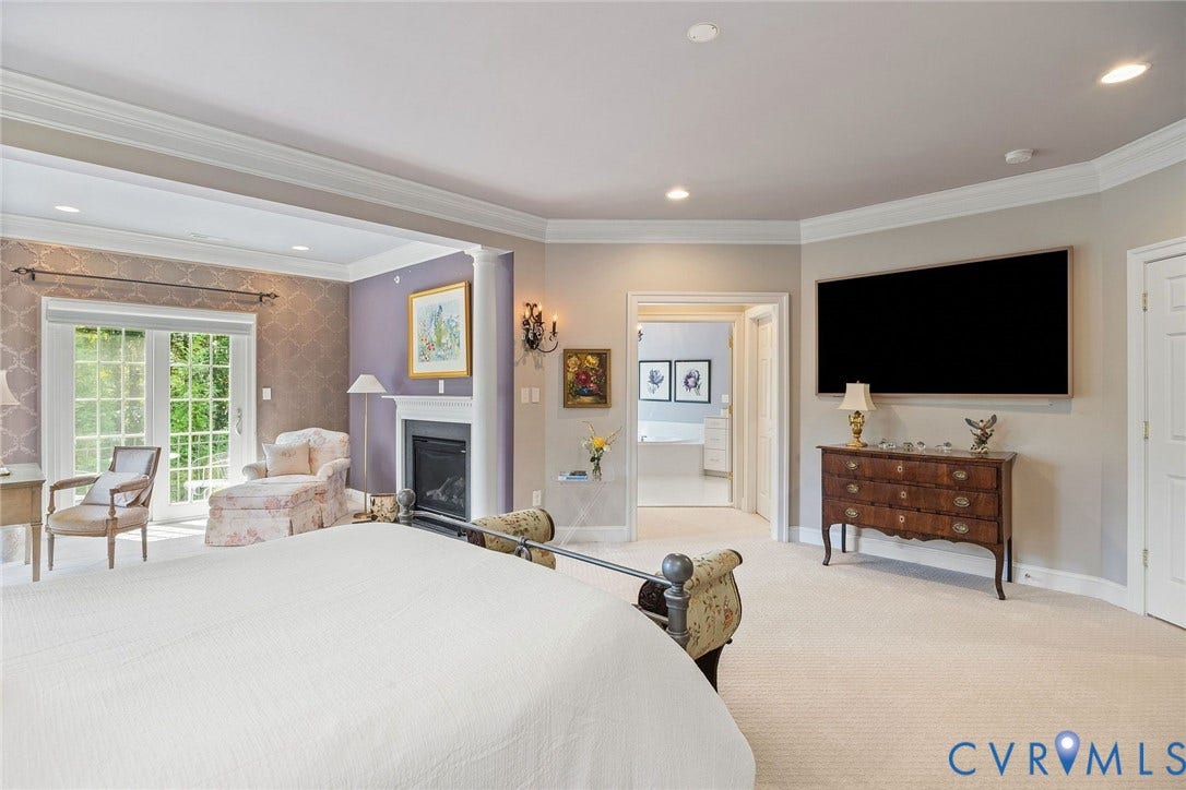Primary Bedroom, Fireplace, Sitting Area, Ensuite Entrance, Walk-in Closet Entrance.