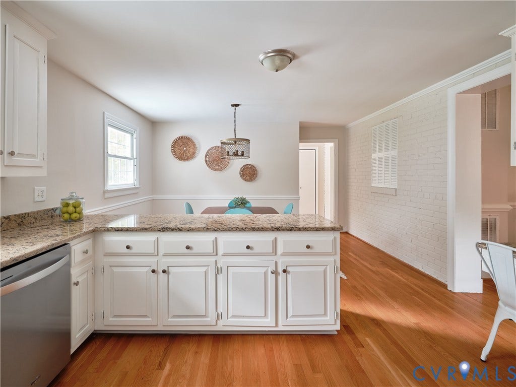 1311 Santa Rosa Road, Henrico, VA 23229 Kitchen and dining area featuring granite countertops, white cabinetry, stainless steel dishwasher, wood-finish flooring, and a decorative pendant light fixture