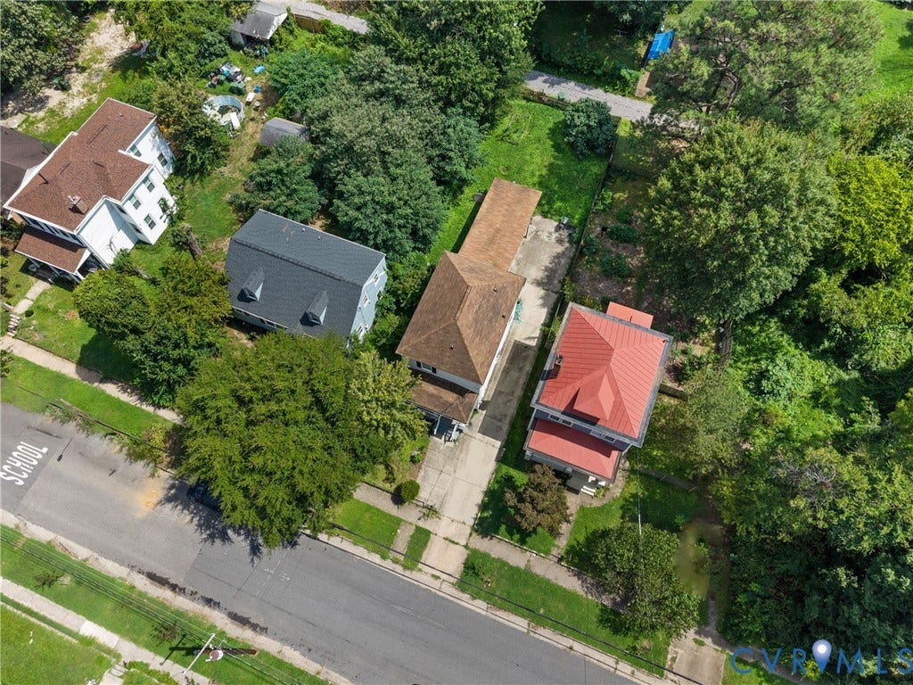 2314 Ingram Avenue, Richmond, VA 23224 Aerial perspective showcasing multiple residential structures and mature tree canopy