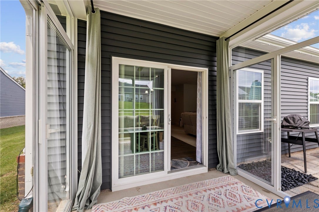 11319 Vulcan Lane, Bermuda, Chester, VA 23831 Covered outdoor patio area featuring a concrete surface and dark siding