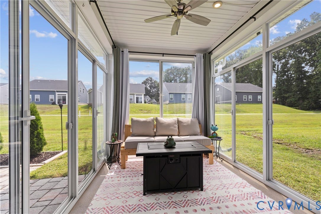 11319 Vulcan Lane, Bermuda, Chester, VA 23831 Enclosed sunroom featuring multiple sliding glass doors, a ceiling fan, and a beadboard ceiling