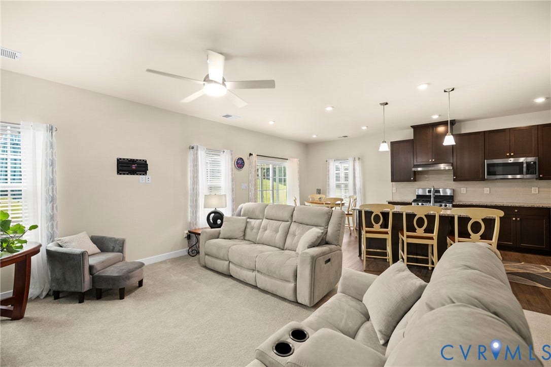 11319 Vulcan Lane, Bermuda, Chester, VA 23831 Open-concept living space featuring a ceiling fan, recessed lighting, and wood-finish flooring in the kitchen