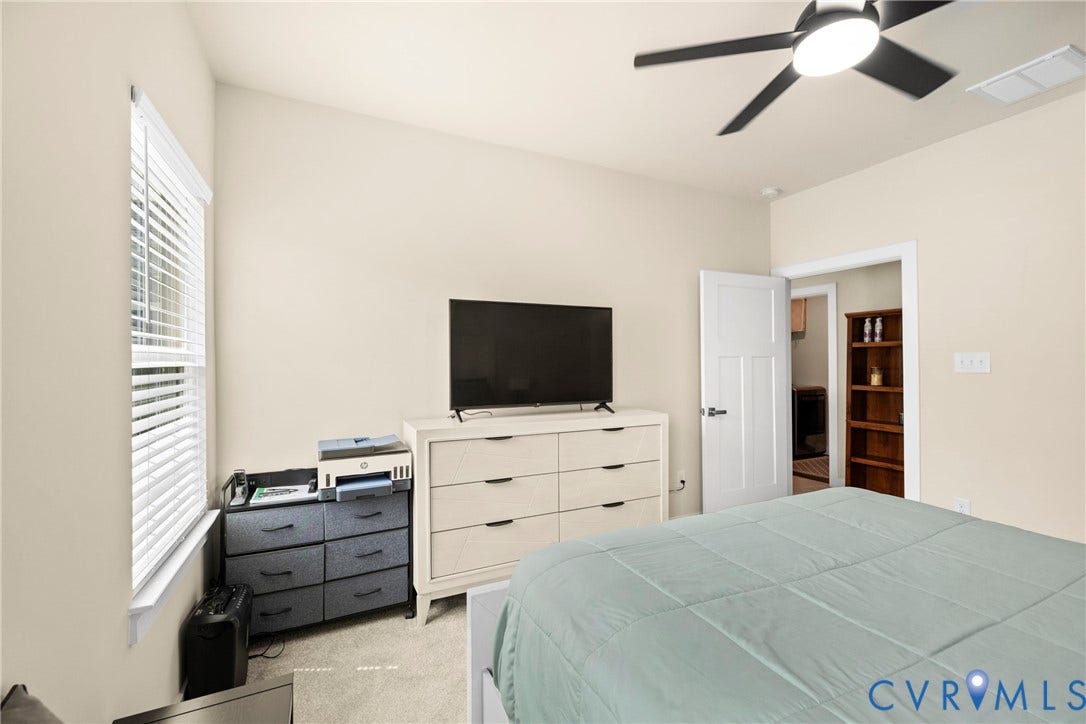 11319 Vulcan Lane, Bermuda, Chester, VA 23831 Window with blinds, wall-mounted ceiling fan, neutral wall tones, and recessed lighting