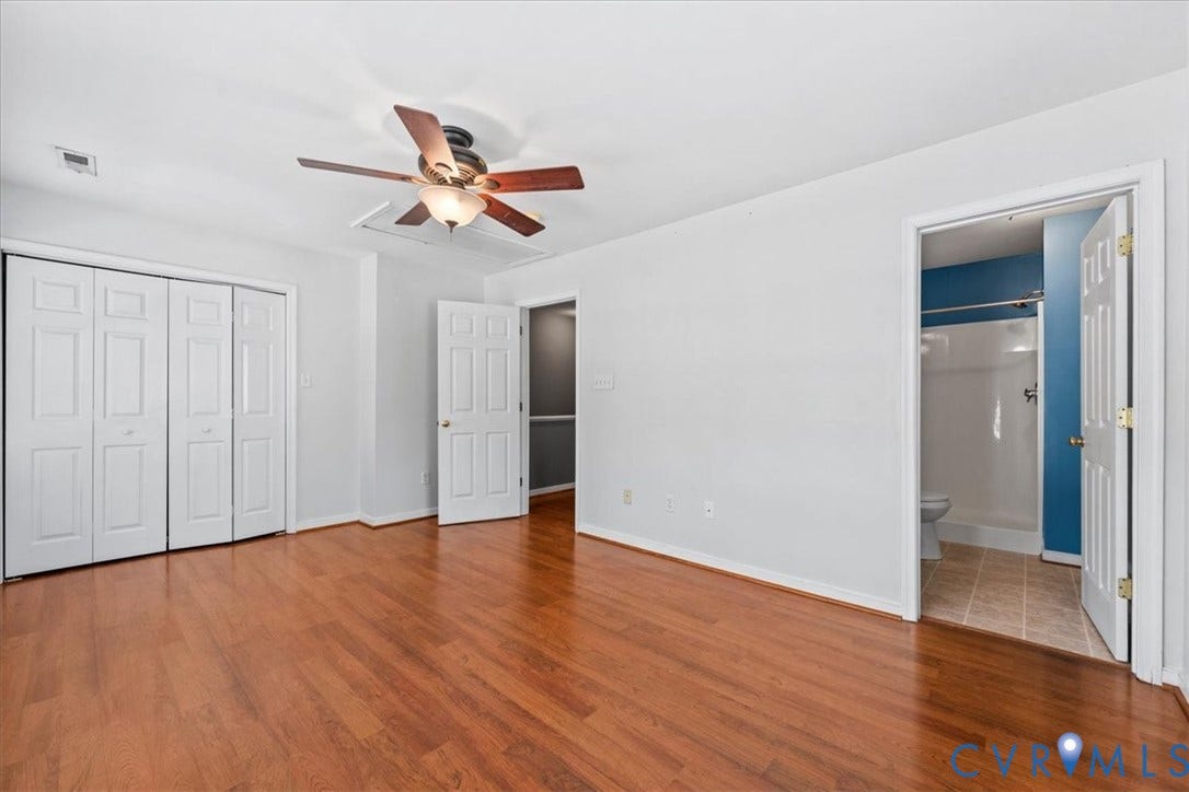 2723 Goyne Terrace, Chester, VA 23831 Wood-finish flooring, ceiling fan with integrated lighting, bi-fold closet doors, white paneled interior doors, and a bathroom with a shower-tub combination