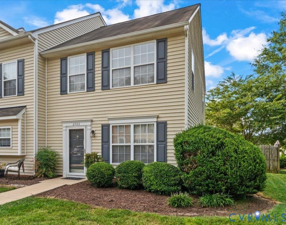 2723 Goyne Terrace, Chester, VA 23831 Two-story facade with horizontal siding, dark shutters, and multiple windows