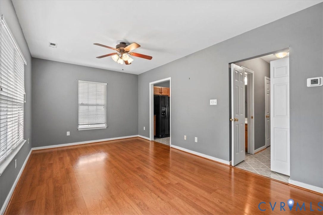 2723 Goyne Terrace, Chester, VA 23831 Hardwood-style flooring throughout, ceiling fan with integrated lighting, multiple windows with blinds, and white panel doors