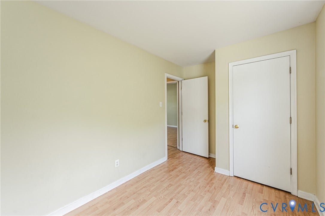 Wood-finish flooring with light-toned walls