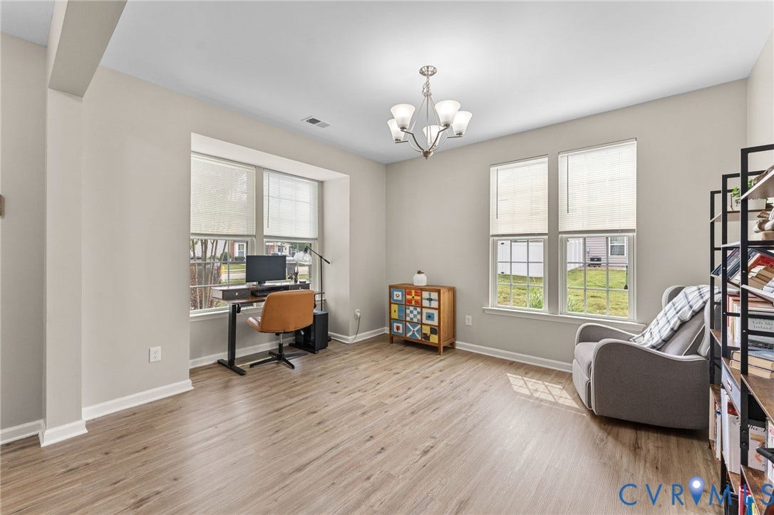 5112 Weatherby Drive, Chester, VA 23831 Wood-finish flooring, multiple windows with blinds, recessed ceiling, five-light chandelier