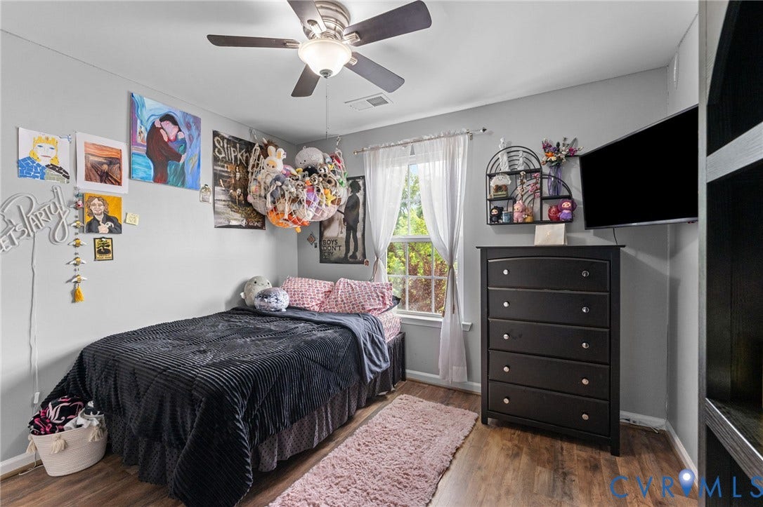 5112 Weatherby Drive, Chester, VA 23831 Wood-finish flooring with a ceiling fan light fixture