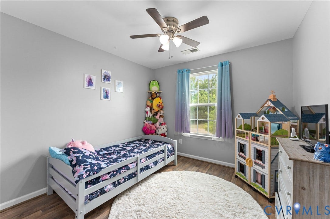 5112 Weatherby Drive, Chester, VA 23831 Hard-surface flooring, ceiling fan with integrated lighting, window, and neutral wall paint