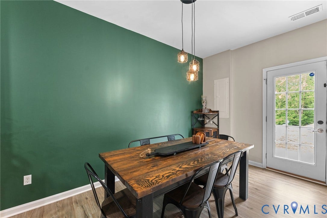 5112 Weatherby Drive, Chester, VA 23831 Wood-finish flooring with a contrasting accent wall