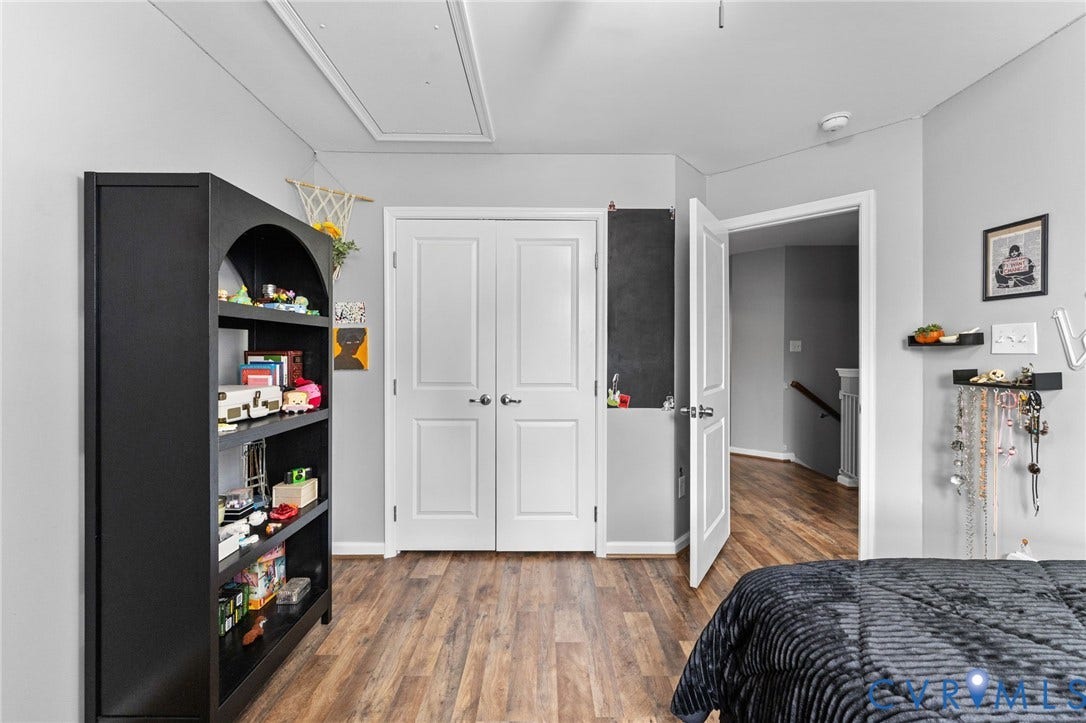 5112 Weatherby Drive, Chester, VA 23831 Wood-finish flooring throughout, white paneled doors, and light gray wall paint