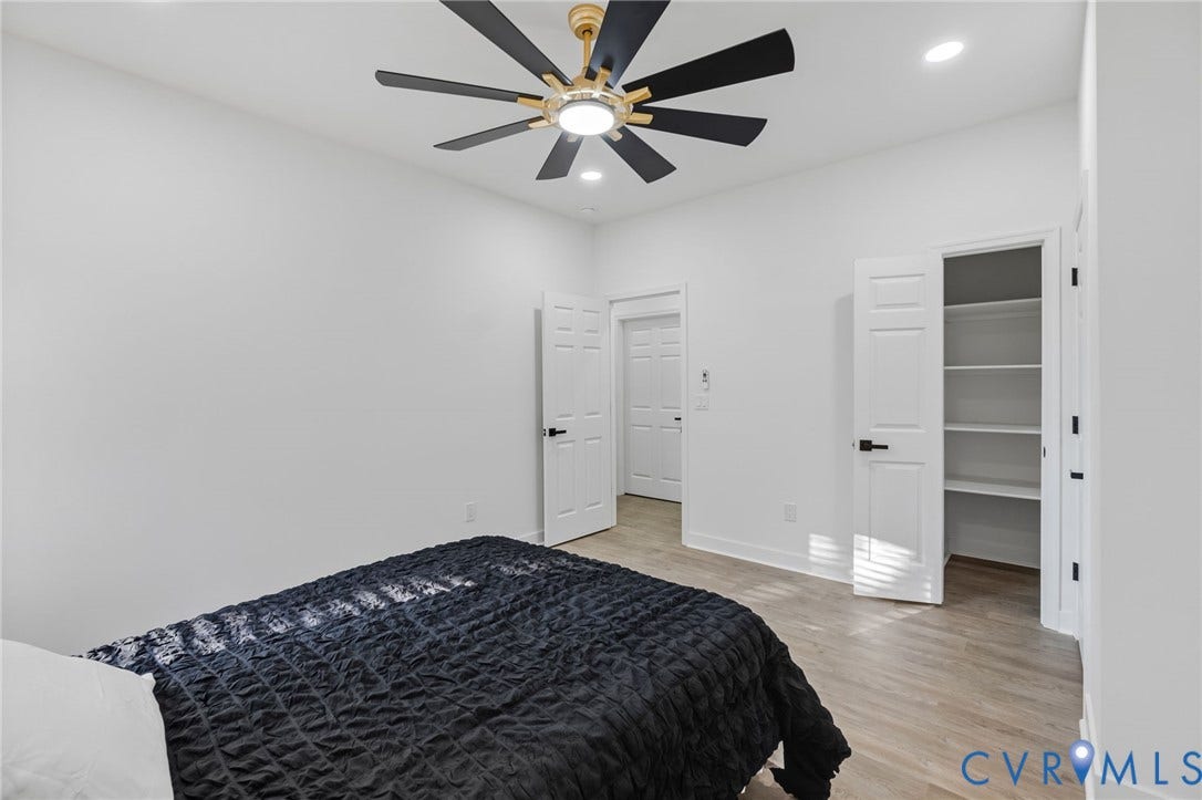 524 Cameron Street, Petersburg, VA 23803 Recessed lighting, wood-finish flooring, ceiling fan with integrated lighting, built-in shelving, and paneled doors