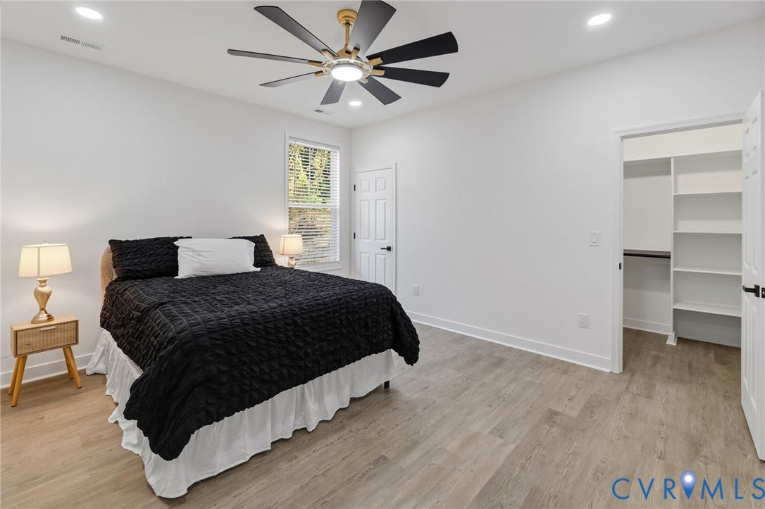 524 Cameron Street, Petersburg, VA 23803 Recessed lighting, ceiling fan with integrated lighting, wood-finish flooring, white trim, and built-in closet shelving