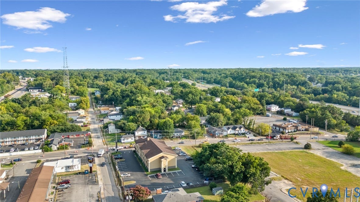 524 Cameron Street, Petersburg, VA 23803 Aerial perspective of a developed area with extensive tree coverage and visible roadways