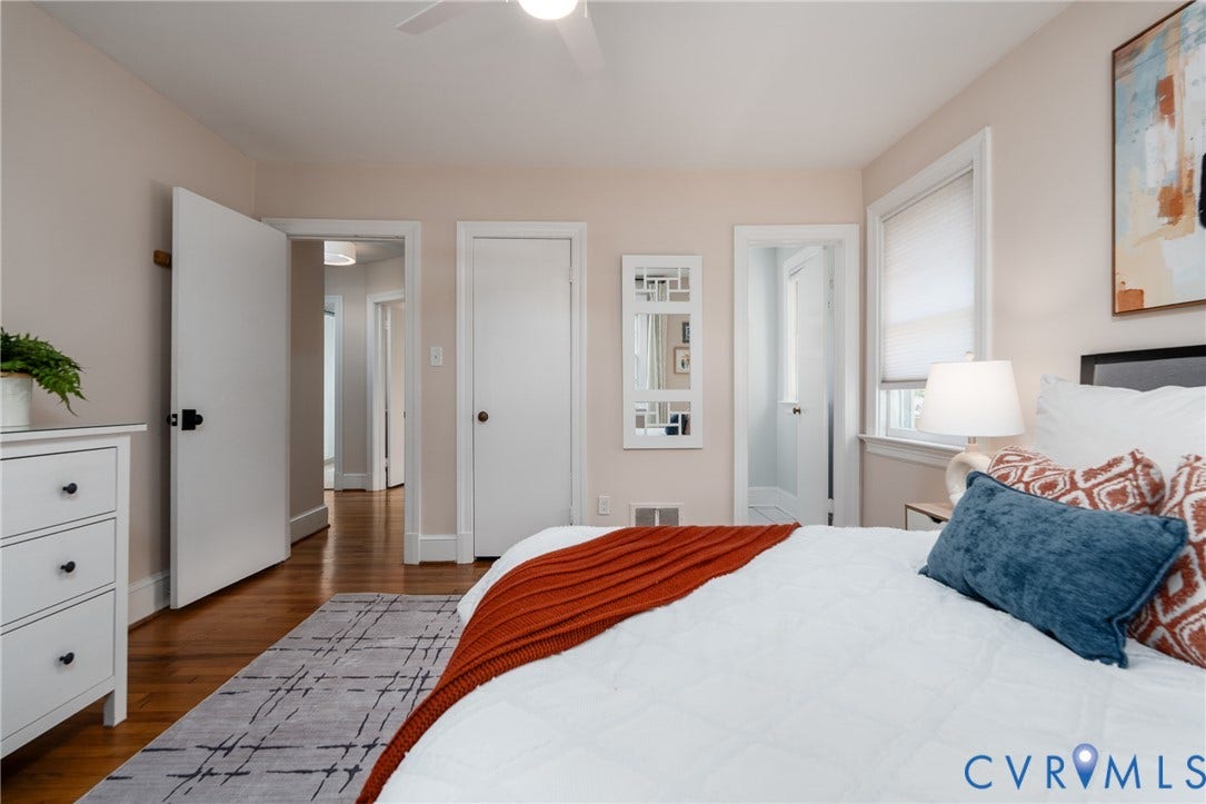 Hardwood flooring and light-toned walls create a bright atmosphere