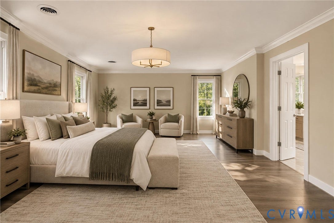Virtually Staged:  Primary bedroom w/ vinyl flooring, spa like primary bathroom and walk in closet. Small sitting room attached. *Photo is virtually staged*