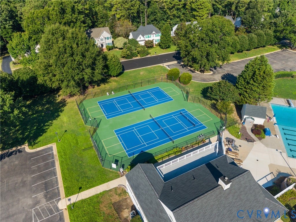 Tennis courts and additional recreation space round out the neighborhood's impressive amenities.