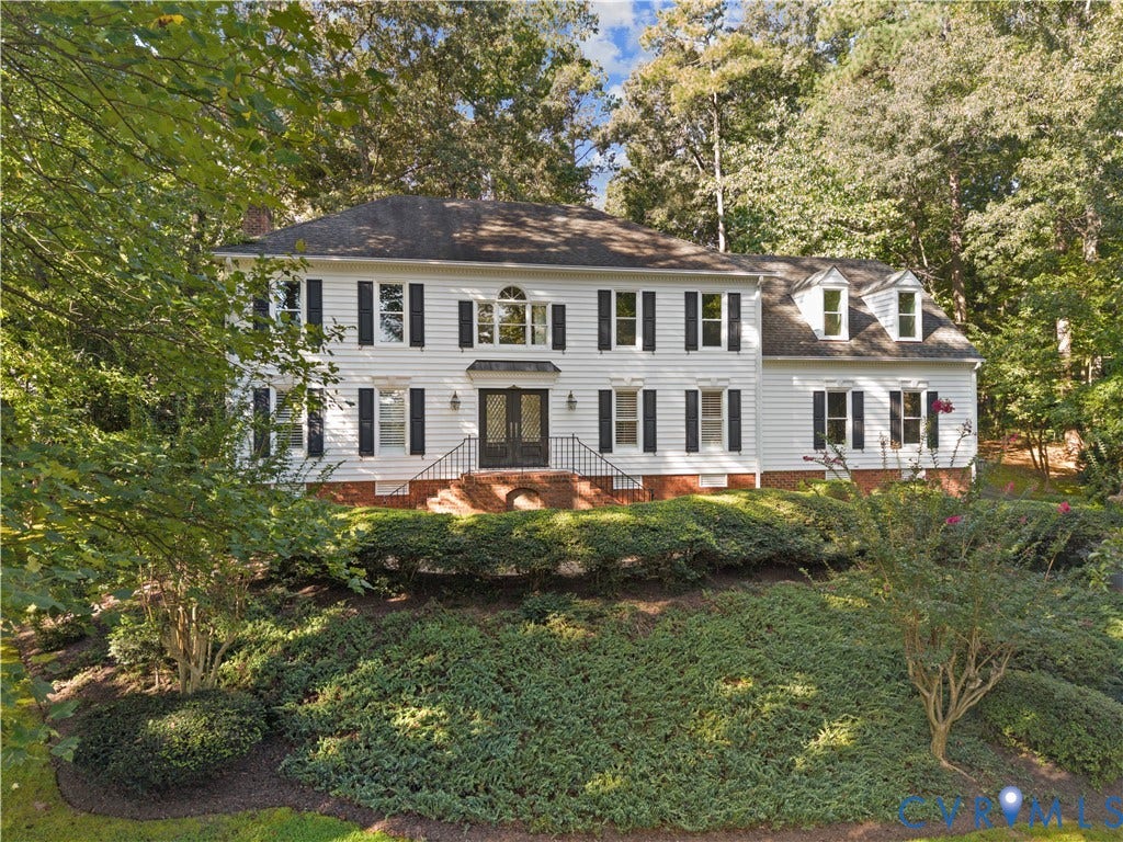 Timeless Colonial architecture and mature, tree-lined landscaping set this home apart on its quiet cul-de-sac lot.