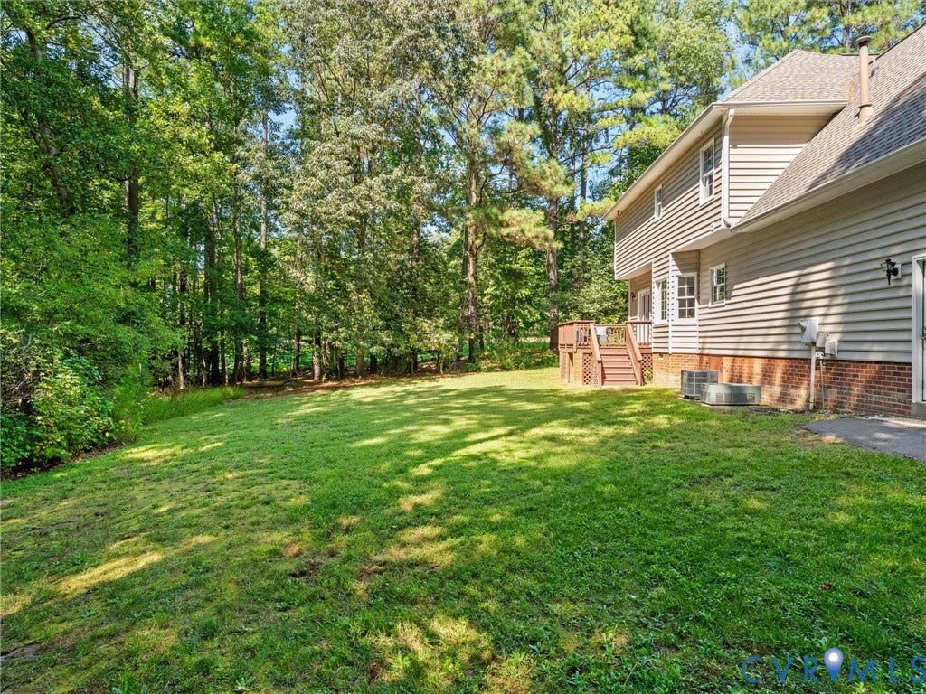 12000 Glen Kilchurn Drive, Chesterfield, VA 23838 Expansive grassy yard with mature trees