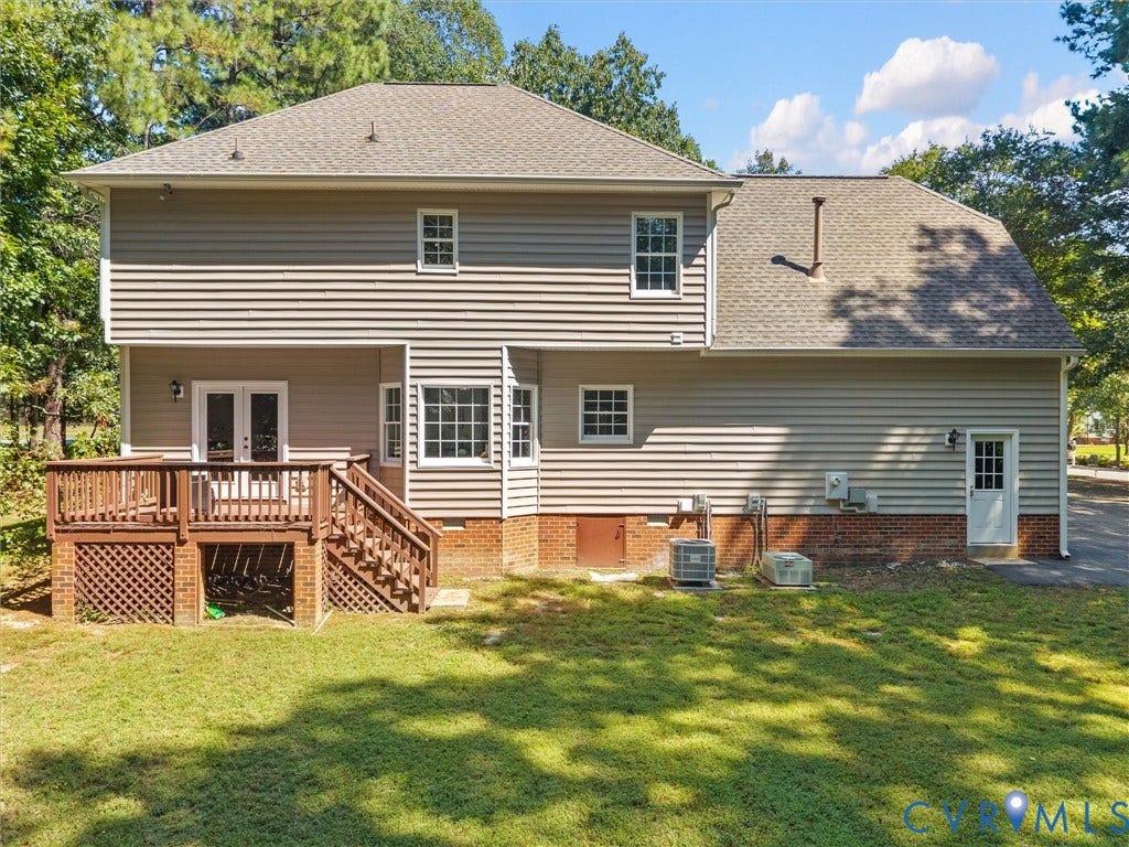 12000 Glen Kilchurn Drive, Chesterfield, VA 23838 Exterior siding with multiple windows, a rear deck, and a second-story dormer