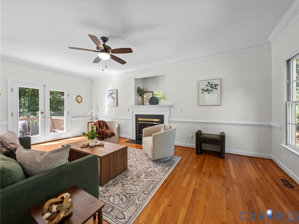 12000 Glen Kilchurn Drive, Chesterfield, VA 23838 Hardwood flooring, crown molding, chair rail molding, built-in fireplace, and double French doors with transom windows