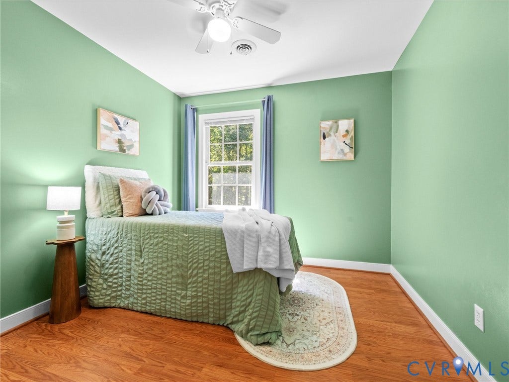 12000 Glen Kilchurn Drive, Chesterfield, VA 23838 Bright room featuring wood-finish flooring, a ceiling fan, and a window with natural light