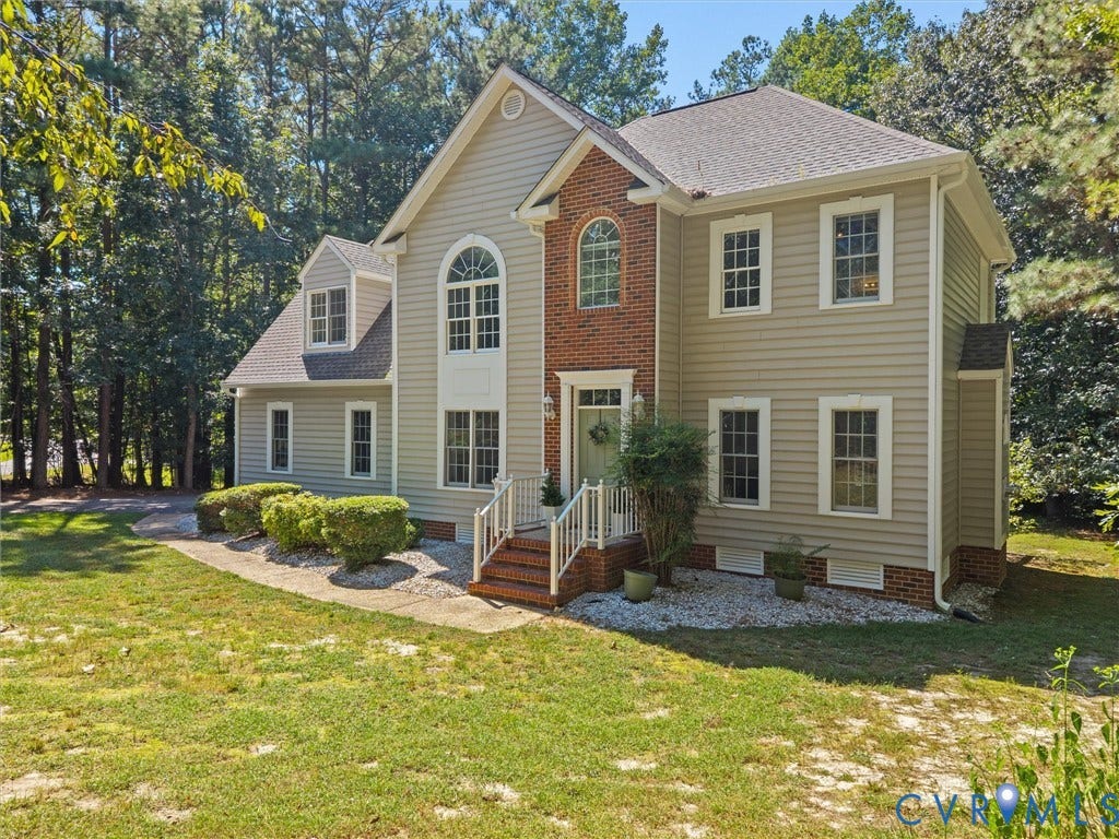 12000 Glen Kilchurn Drive, Chesterfield, VA 23838 Traditional-style residence with light-colored siding and brick accents