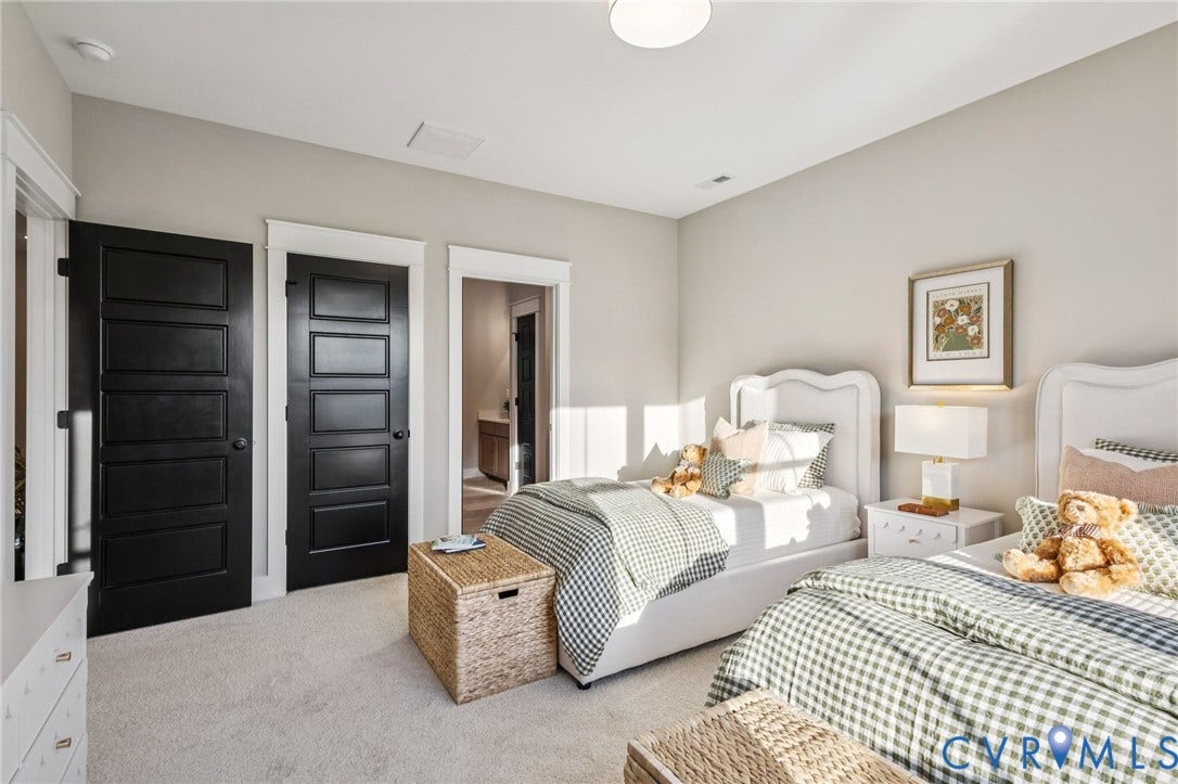 Lot 5 Olivet Church Road, Olivet Church Estates, New Kent, VA 23124 Neutral wall paint, two paneled black interior doors, white trim, and light-colored carpet