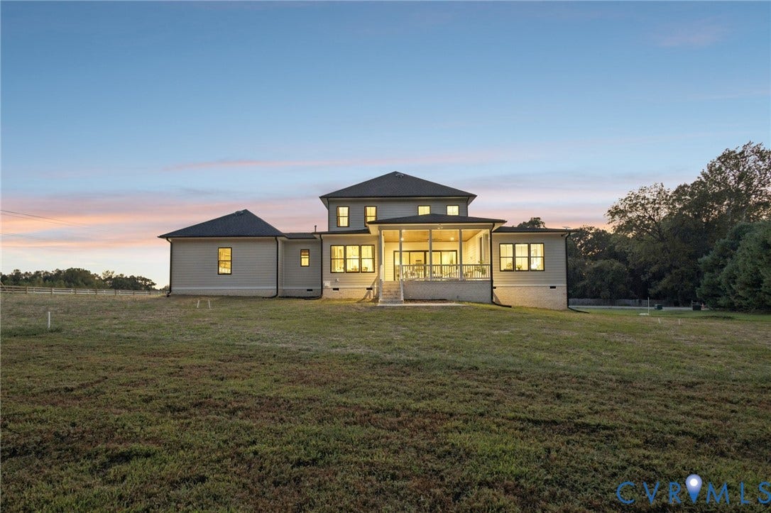 Lot 5 Olivet Church Road, Olivet Church Estates, New Kent, VA 23124 Expansive rear elevation featuring a screened porch, multiple windows, and a sloped lawn
