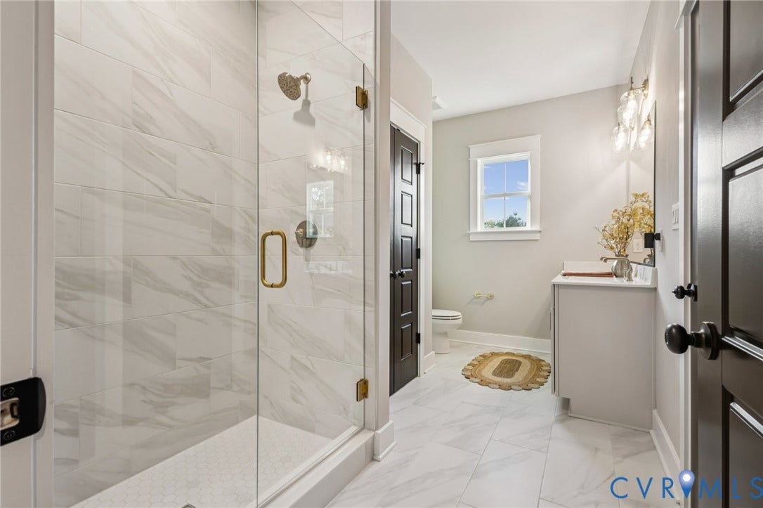 Lot 5 Olivet Church Road, Olivet Church Estates, New Kent, VA 23124 Glass-enclosed shower with gold-tone hardware