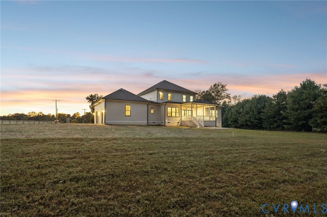 Lot 5 Olivet Church Road, Olivet Church Estates, New Kent, VA 23124 Expansive grassed area, multi-level dwelling with light-colored siding, covered porch, and mature trees
